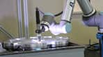 image of a cobot cutting casts